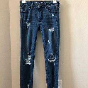 Distressed denim jeans super stretch